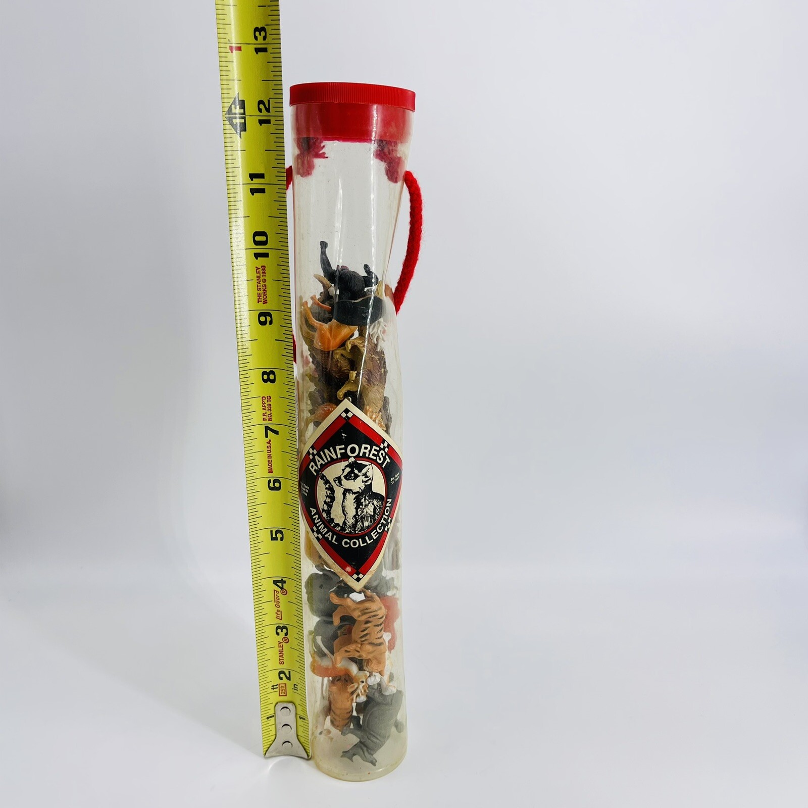 VTG 1994 NATURAL WONDERS RAINFOREST COLLECTION TUBE OF ANIMALS JUNGLE LEARNING