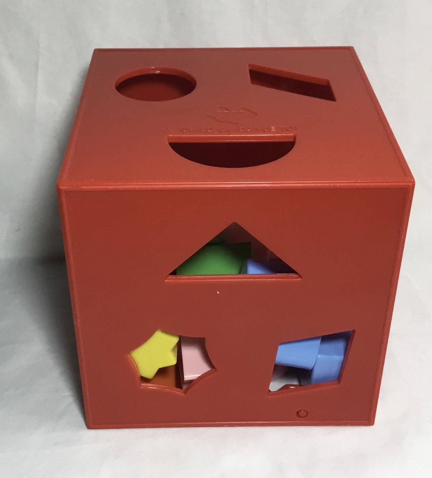 Toy shape sorter, Child Guidance, complete set 18 shapes, 5.5″ red cube