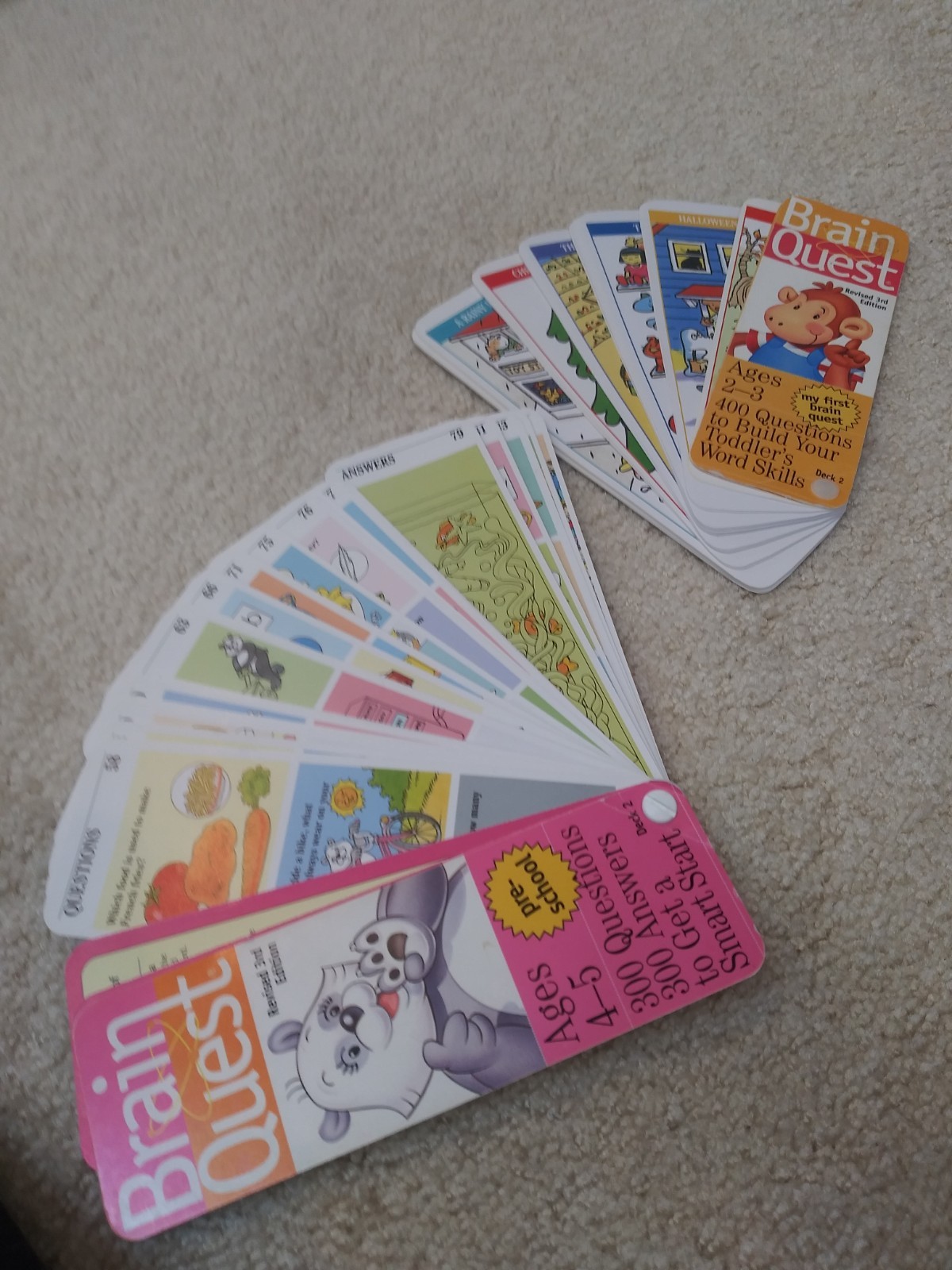 Brain Quest Cards Ages 2-3 and pre-school for ages 4-5. Total of 700 questions