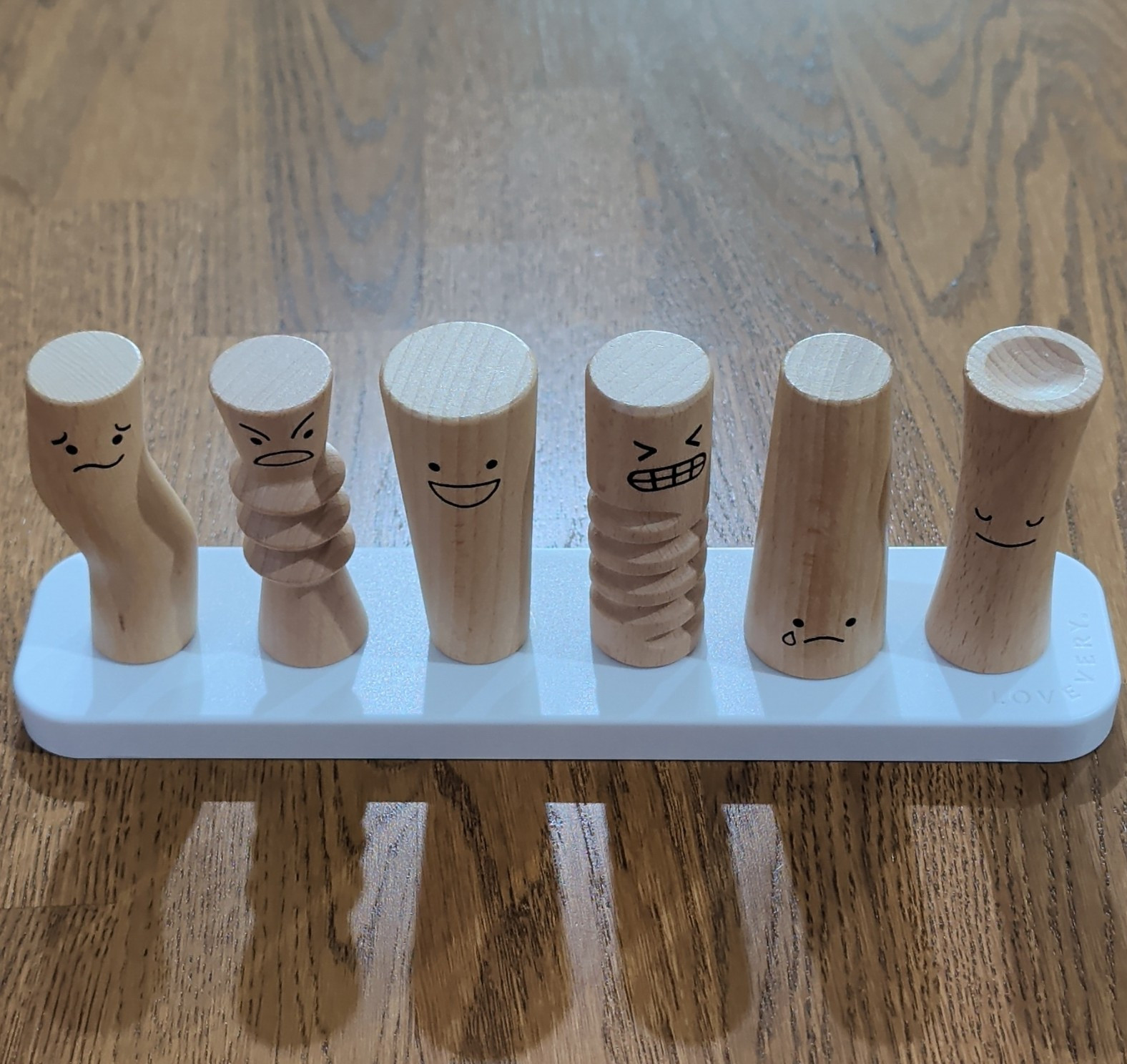 Lovevery Wooden Emotion Pegs Educational Toy Set w/ White Base Stand