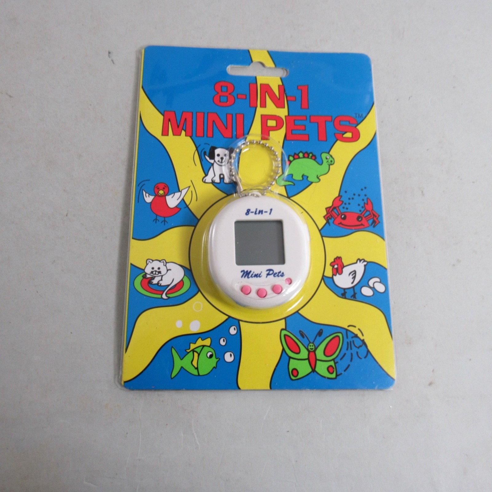 Vintage Tamagotchi Style Virtual Pet 8 in 1 Mini Pets White
