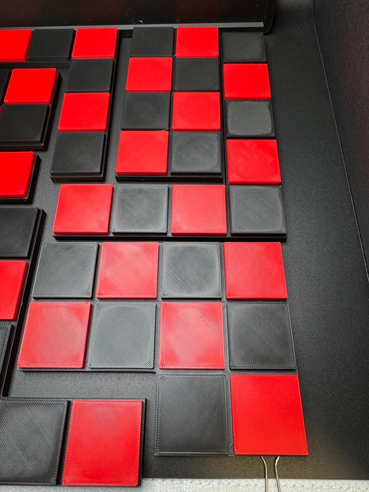 Checkerboard Dissection Puzzle – Battle Royale by Sam Loyd
