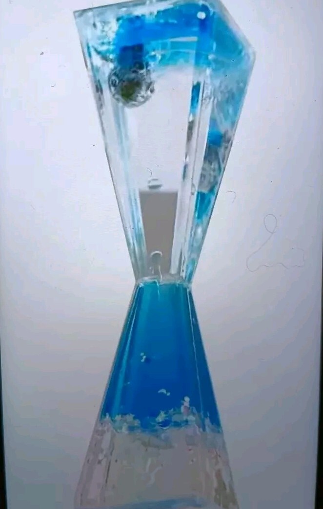 Liquid Hourglass Resin Statue Moonman Figurine With Lighted Base