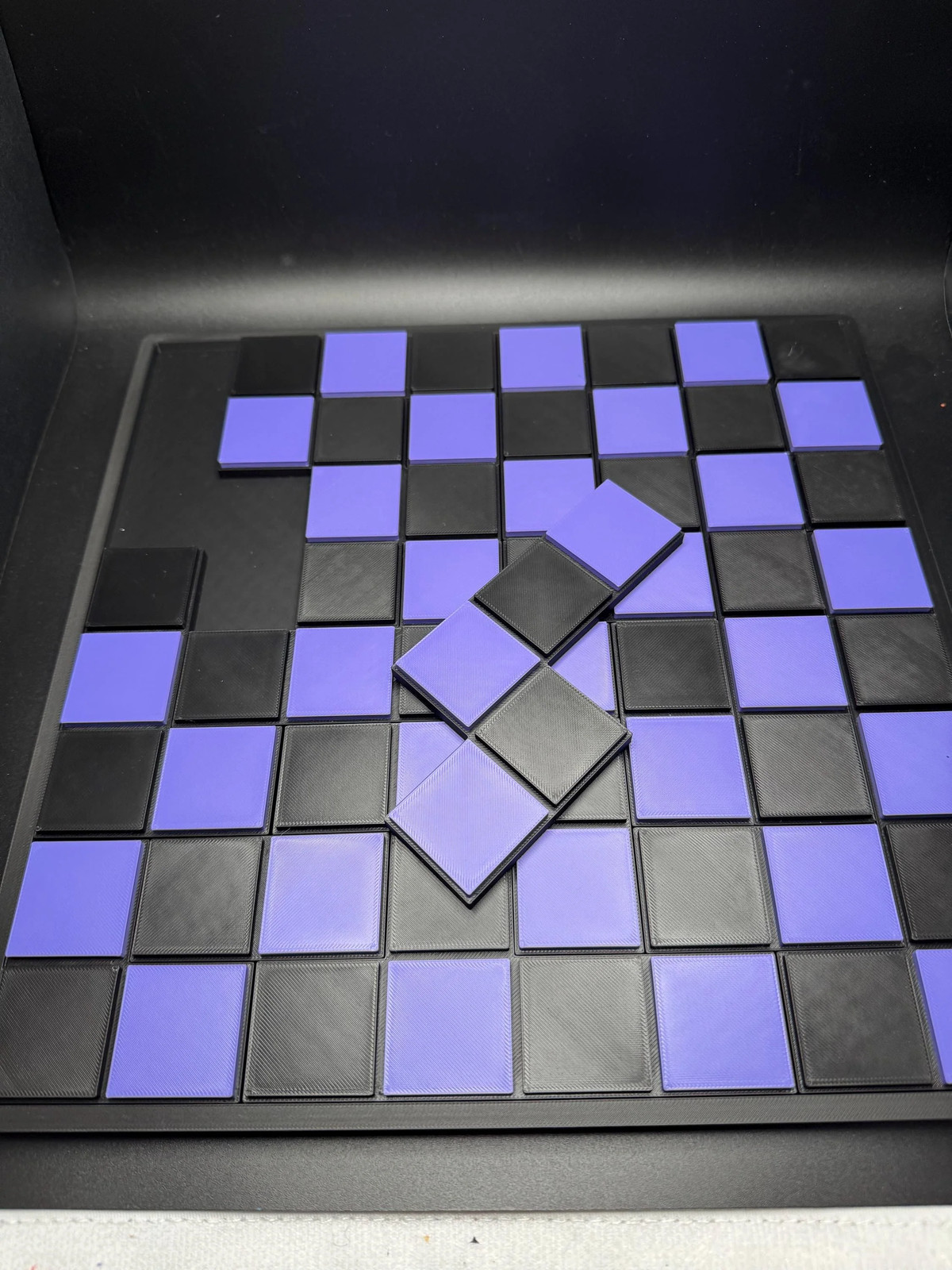 The Bug House Puzzle – A Checkerboard Dissection – Modern Recreation of a