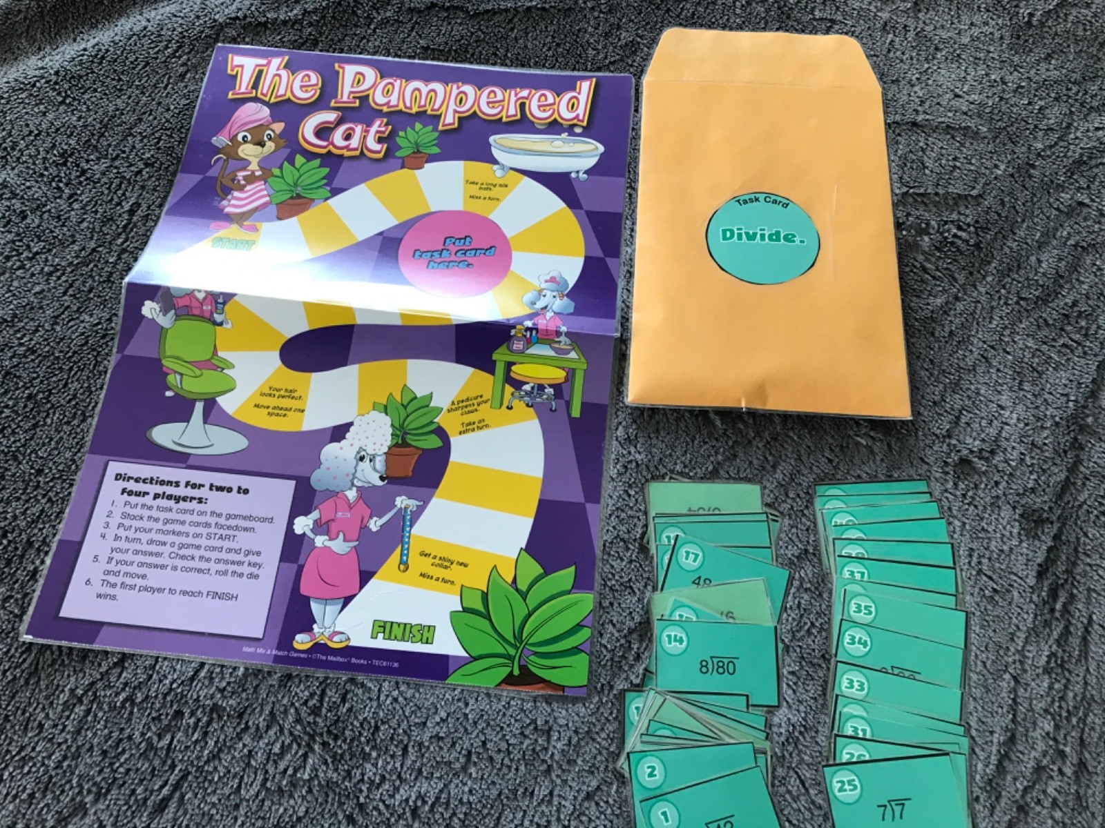 The Pampered Cat! Dividing by 6, 7, 8, 9 math file folder game grade 4
