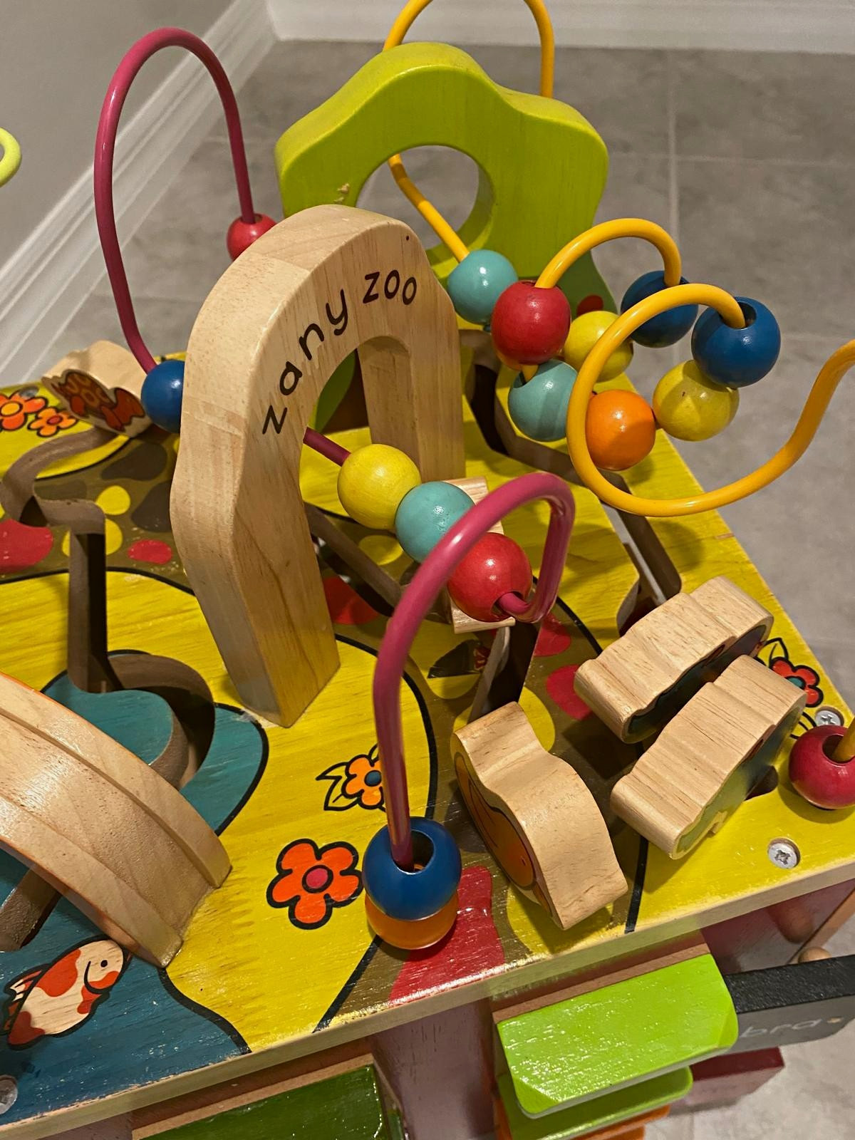 B. toys Zany Zoo Wooden Activity Cube w/ Bead Maze, Animal Blocks & Spinners