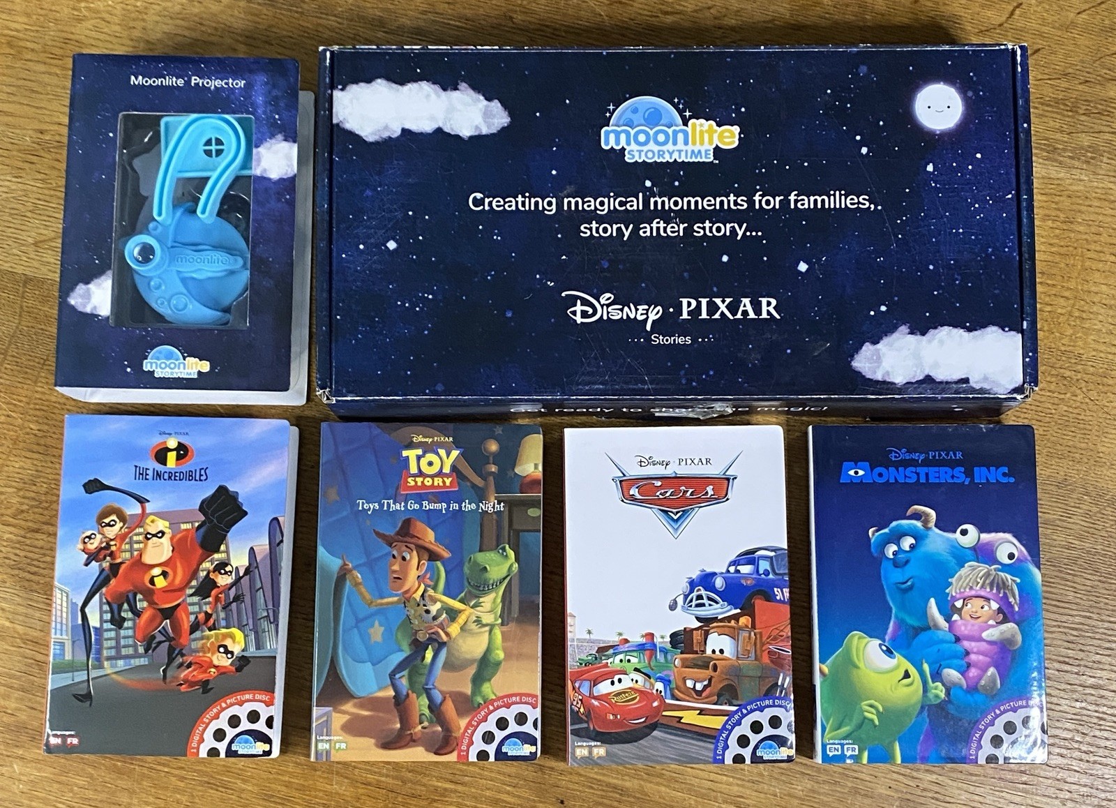 Moonlite Storytime Reels Projector Disney Pixar Toy Story Cars Monsters Inc