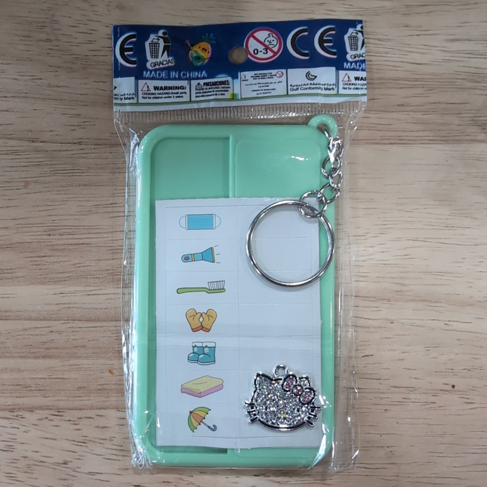 Green Chore chart keychain W/Hello Kitty Charm