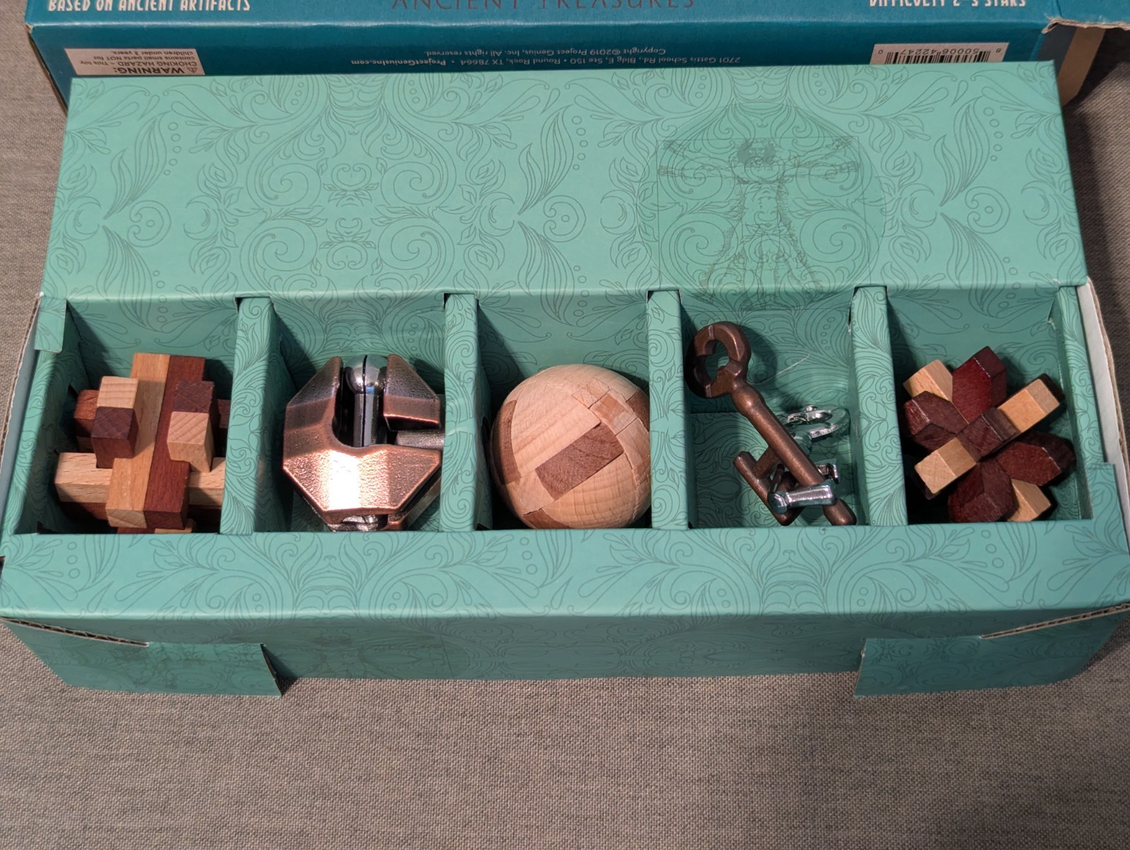 True Genius Ancient Treasures Puzzle Set Wood and Metal Brainteaser Artifact Gif